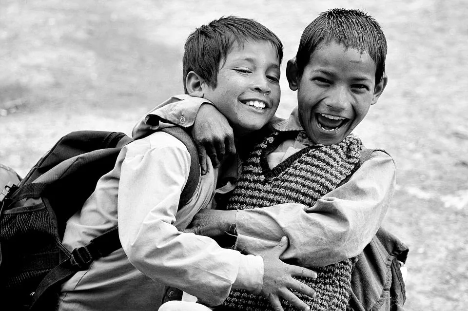 Two Middle School students on their way between lessons